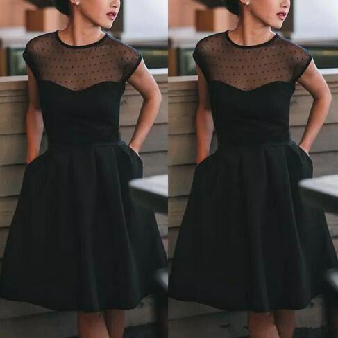black cocktail dress with sheer sleeves
